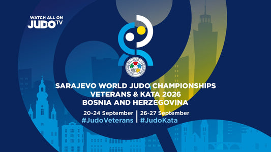 Blue and yellow event graphic with a judo emblem, city skyline silhouettes and white lettering.